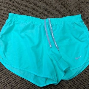 Nike women’s athletic dry fit running shorts with back zipper mint green